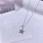 Colar de estrela do mar em prata esterlina S925 com pérola e micro-diamantes cravejados. Adicione brilho e elegância ao seu visual. — foto 8