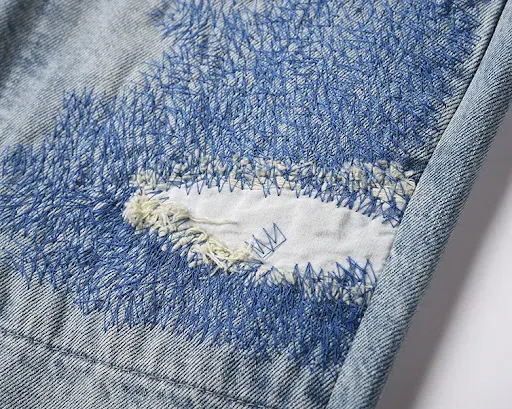 Title 1, Calças jeans lavadas com costura de tinta respi...