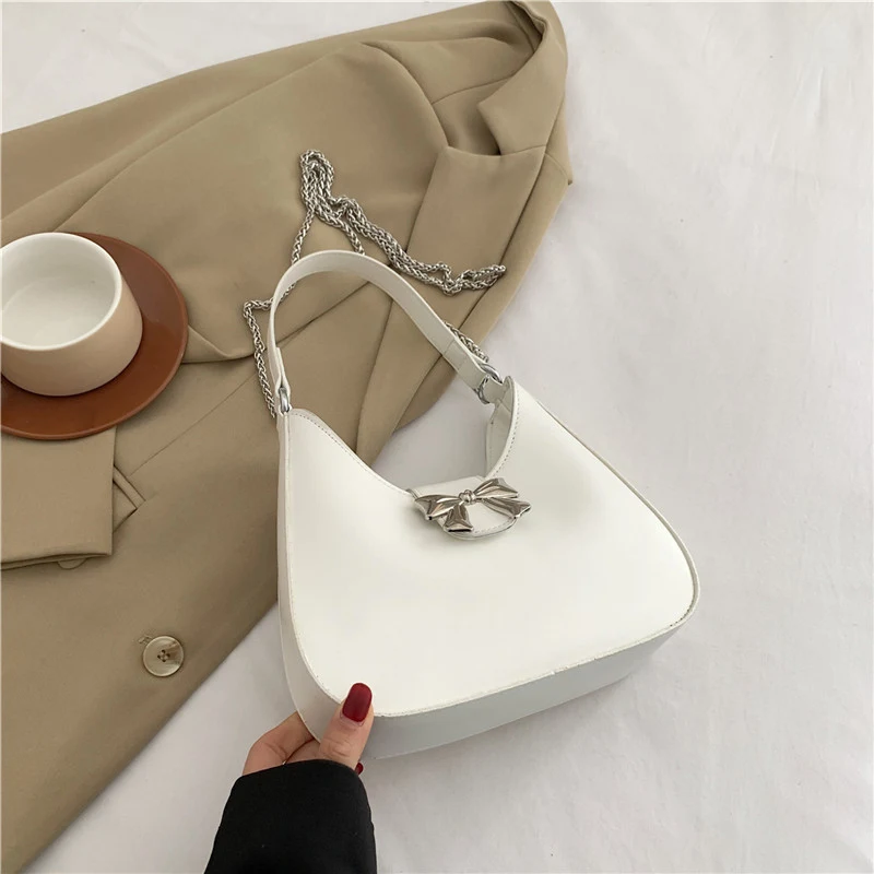 Bolsa feminina estilo Western simples Elegância e praticidade em um só acessório. Perfeita para o dia a dia, combina com diversos looks. Design atemporal. — foto 4