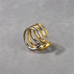 Anel aberto multicamadas com cores contrastantes ouro e prata. Design moderno e sofisticado, perfeito para adicionar um toque de elegância ao seu visual. — foto 2