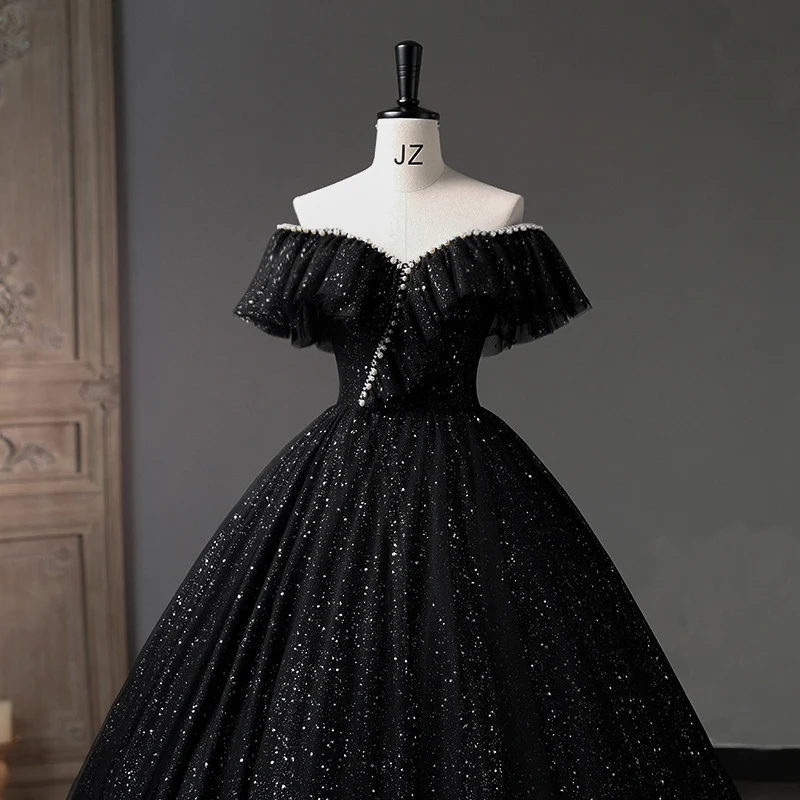 Title 9, Abito nero da esibizione con scollo a V da donna