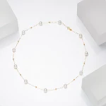 Colar artesanal com pérolas naturais de água doce e detalhes de estrela. Beleza e sofisticação, ideal para realçar sua elegância natural. Um luxo atemporal. — foto 2