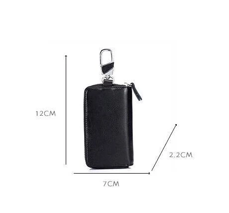 Portachiavi multifunzionale in pelle con zip. Protegge e organizza chiavi, carte e contanti con stile. Design compatto e pratico per l'uso quotidiano. — foto 1