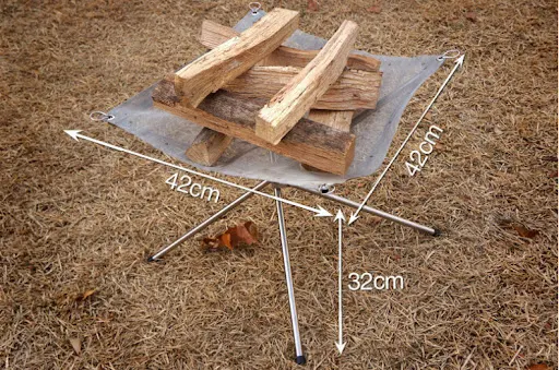 Title 2, Portable Folding Campfire Stand. Enjoy a safe a...