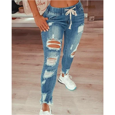 Dünne Damen Jeanshose mit zerrissenen Löchern für einen lässigen und trendigen Look. Genieße den Komfort und den coolen Stil dieser Hose. — foto 3