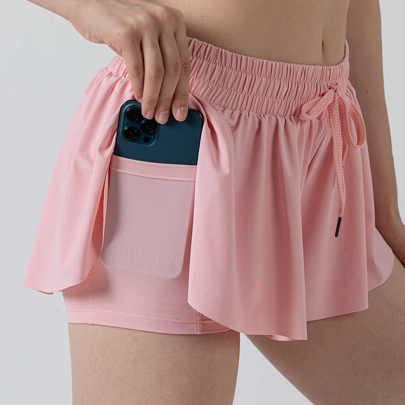 Yoga-, hardloop-, fitness- en tennis culottes voor dames. Comfortabele en functionele broekrok voor sportieve activiteiten, ontworpen voor bewegingsvrijheid. — foto 18