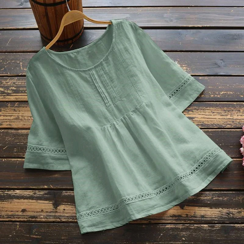 Blusa de verão em algodão e linho de cor sólida com mangas médias. Perfeita para o calor, oferece frescor, conforto e um visual leve e elegante. — foto 1