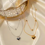 Colar duplo banhado a ouro 18K para mulheres, perfeito para realçar a clavícula e adicionar elegância ao seu visual diário. — foto 1