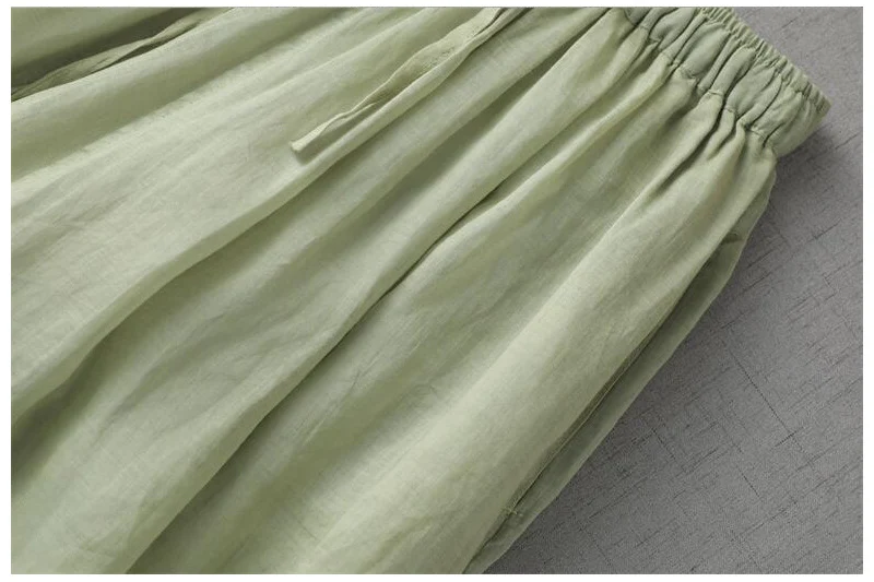 Calças femininas casuais de cintura elástica e soltas estilo bloomers, perfeitas para um visual descontraído e confortável no dia a dia. — foto 2