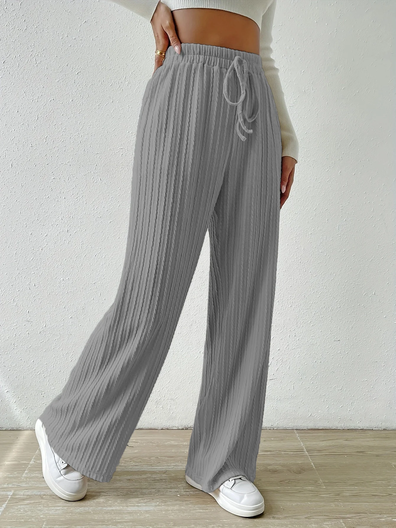 Women's Knot Waist Textured Knit Wide Leg Trousers offer comfortable style. Perfect for everyday wear or a night out. — photo 34