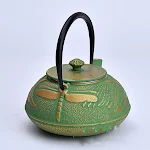 Iron pot featuring a golden and green dragonfly design. Enjoy durable cooking and enhance your kitchen's aesthetic appea — photo 4