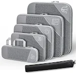 Bolsa de compressão para viagem com compartimento para sapatos e rede visual. Organize sua bagagem de forma eficiente e prática. — foto 7