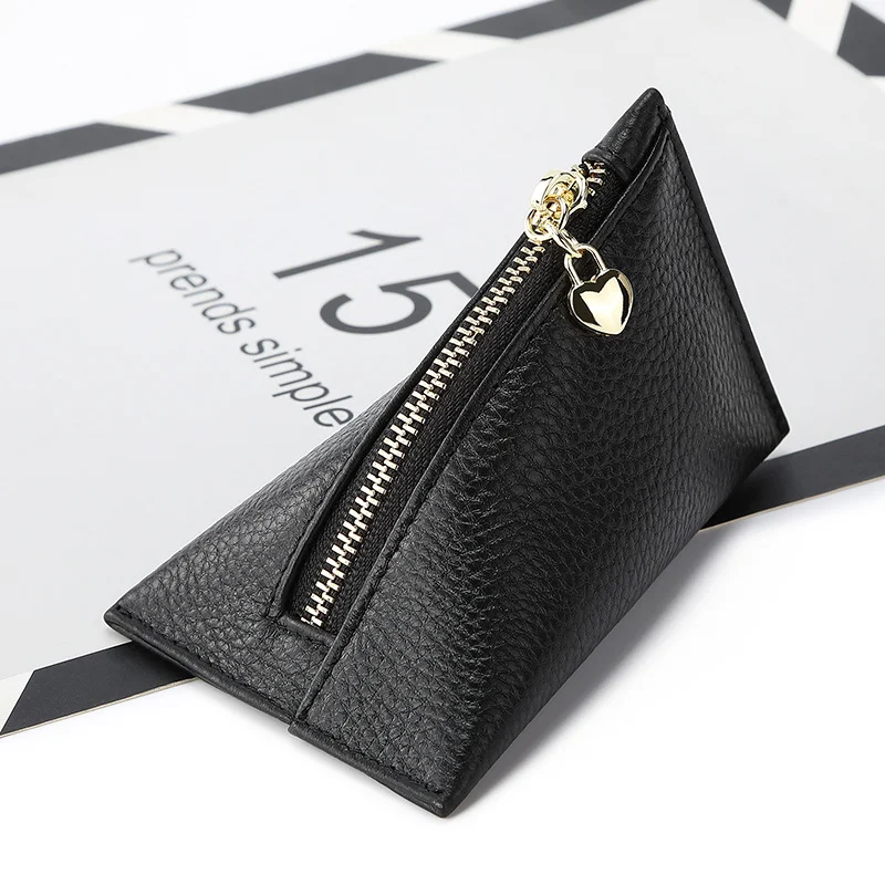 Dames Mini Portemonnee van Koeienhuid, Subtiel en Creatief, Klein en Exclusief, Ideaal voor Munten en Pasjes, een stijlvolle en praktische accessoire. — foto 8