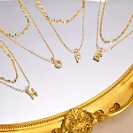 Colar feminino aço inoxidável 26 letras incrustadas zircônia estrela brilhante pingente com iniciais — foto 28