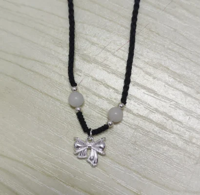 Colar de laço dourado aluvial feminino, tecido à mão. Adicione um toque de elegância e sofisticação ao seu visual com este colar exclusivo. — foto 2