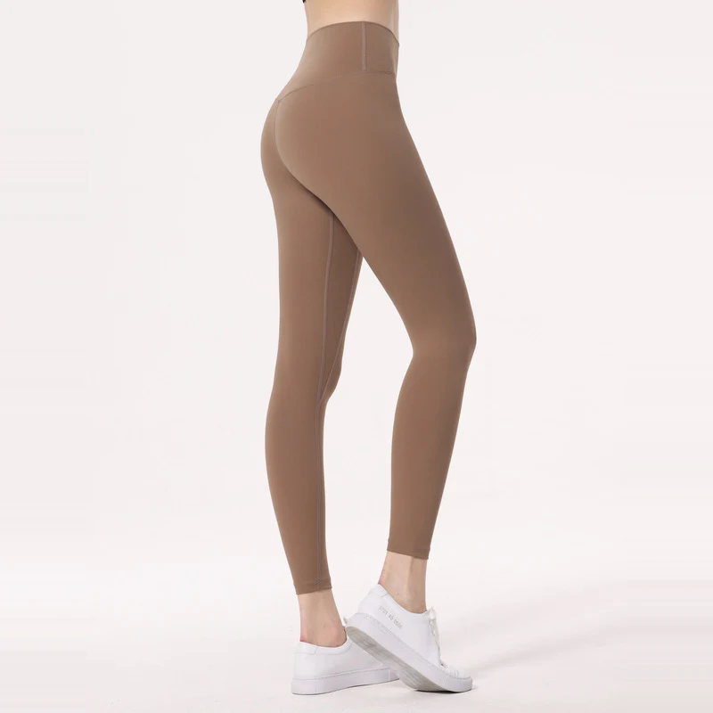 Calça legging de ioga feminina de cintura alta, cor lisa e tecido escovado, estilo elegante. Conforto e sofisticação para seus treinos e atividades diárias. — foto 10
