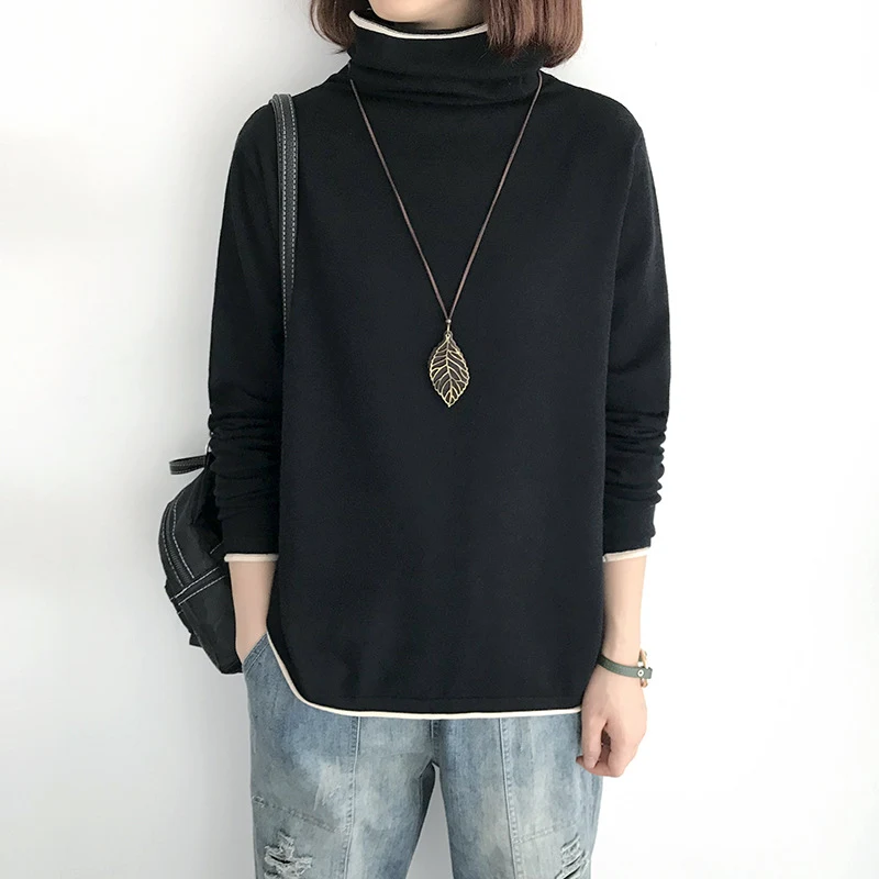 Suéter de fundo fino e fino feminino com gola alta solta — foto 1
