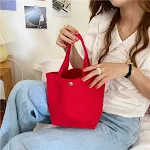 Bolsa de lona portátil, lancheira e nécessaire de maquiagem combinados. Perfeita para o dia a dia, transporta seus itens essenciais com praticidade. — foto 10