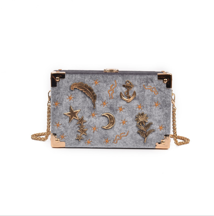 Bolso rígido bandolera con bordado de estrellas y diseño asimétrico de un solo hombro, elegante y moderno para cualquier ocasión. — foto 2