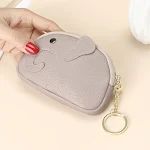 Creatieve dames sleutelhanger cartoon olifant portemonnee, combineert sleutelhanger en portemonnee, ideaal voor vrouwen die stijl en functionaliteit zoeken. — foto 12