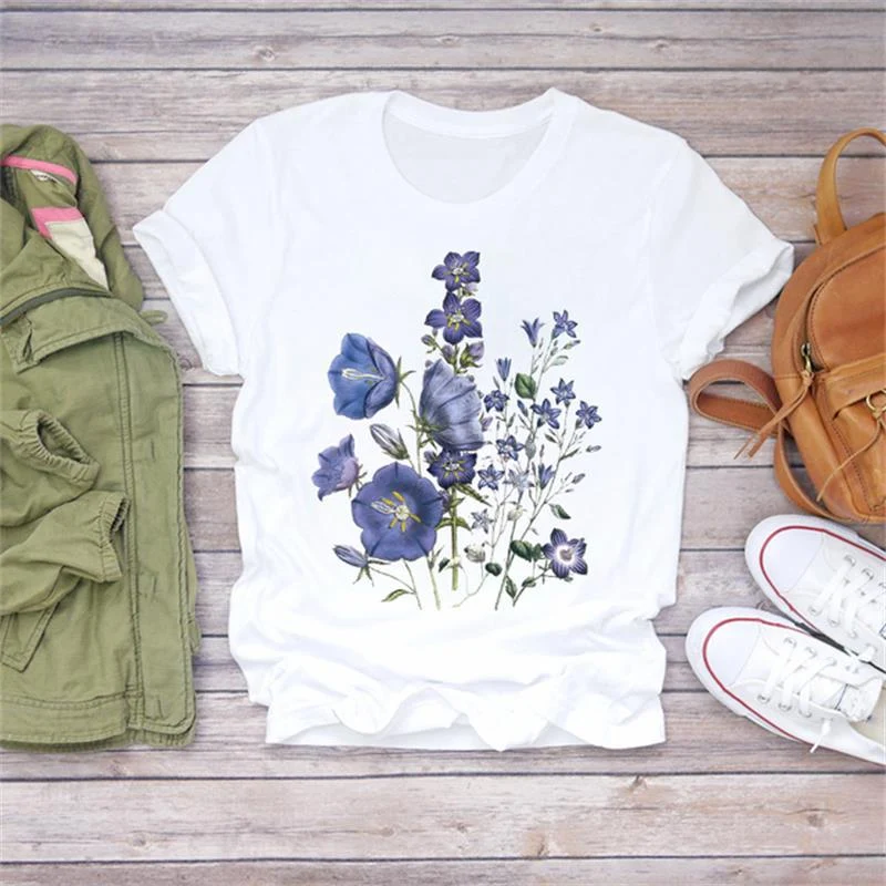 Camiseta feminina casual com estampa floral modal, manga curta, leve e confortável, perfeita para um visual charmoso e fresco. — foto 12