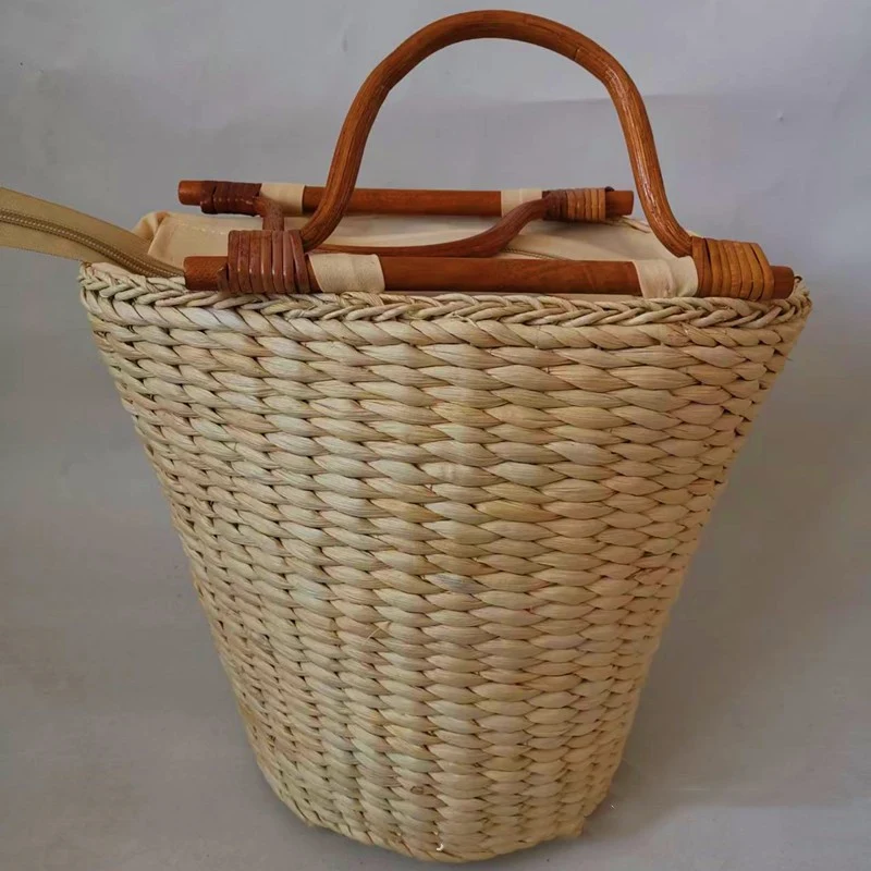 Straw Braided Bucket Bag with Vintage Rattan Handle. A stylish and practical bag, perfect for carrying your essentials w — photo 1