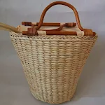 Straw Braided Bucket Bag with Vintage Rattan Handle. A stylish and practical bag, perfect for carrying your essentials w — photo 1