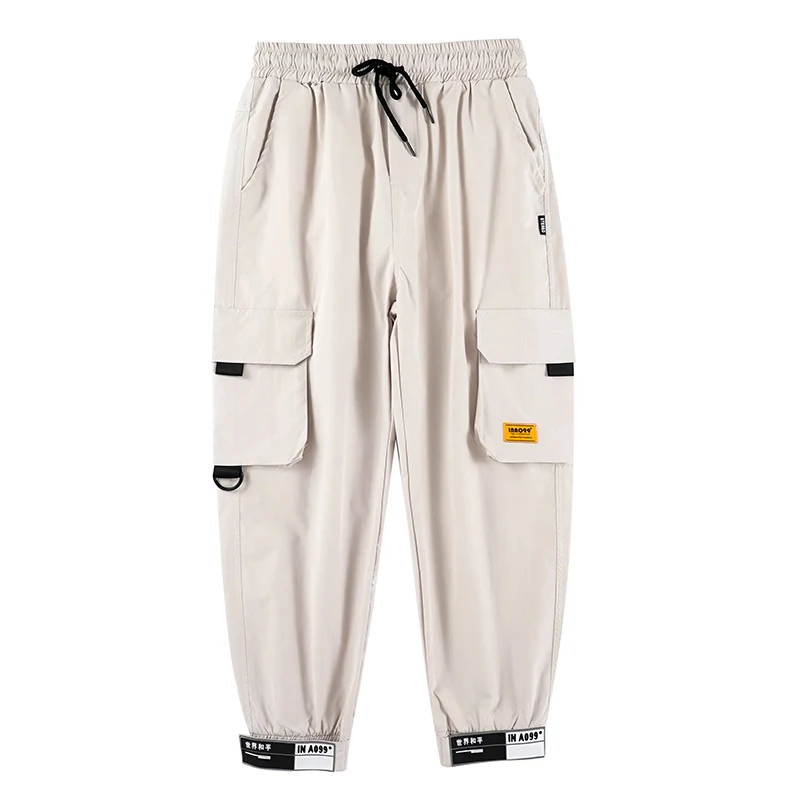 Title 4, Harem pants with velcro straps, offering a comf...