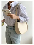Bolsa de ombro versátil em lona estilo balde, ideal para uso sob o braço ou no ombro, espaçosa e prática para o dia a dia. — foto 6