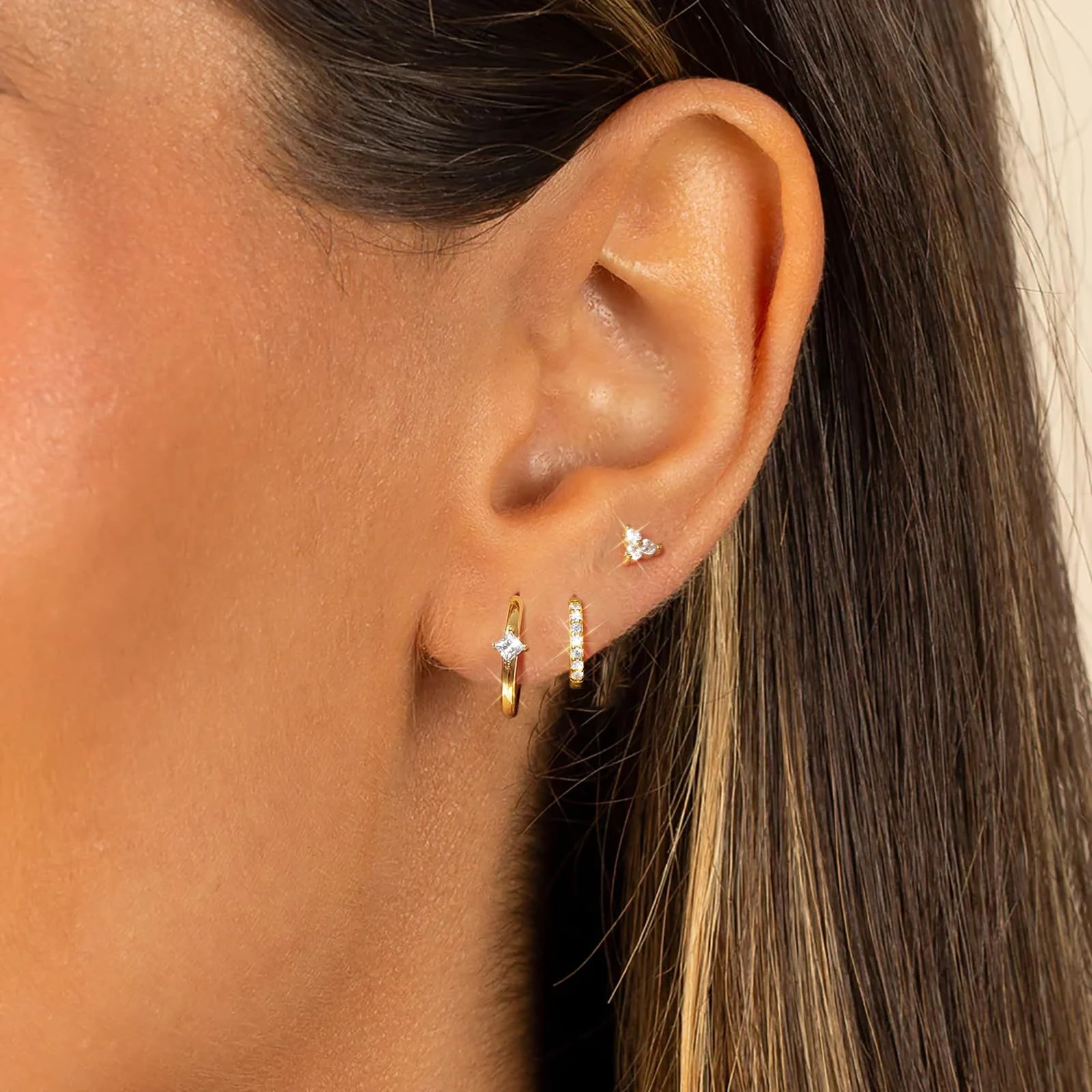 Conjunto de brincos femininos de moda com quatro estrelas de oito pontas e zircônias incrustadas, para um visual elegante e moderno. — foto 2