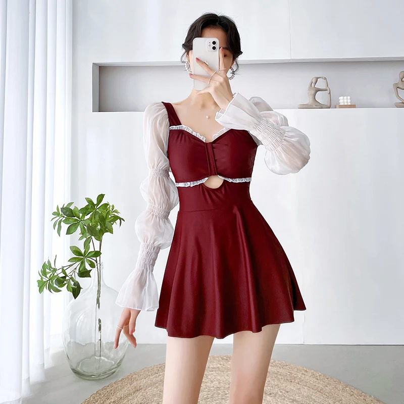Long-sleeved conservative one-piece skirt swimsuit for hot springs, designed to cover the belly and create a slim silhou — photo 4
