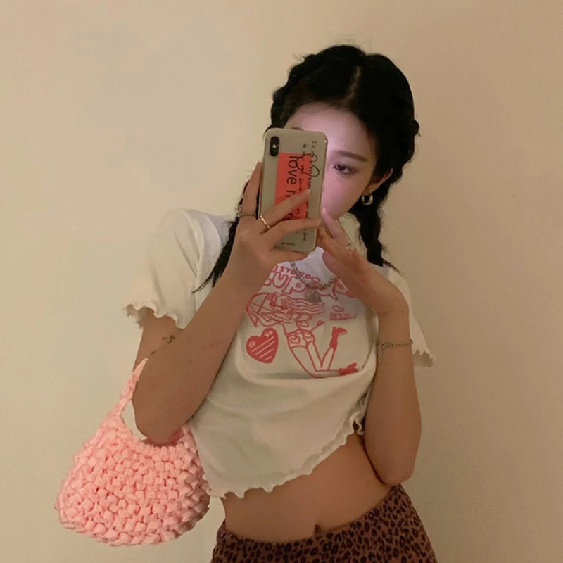 Witte T-shirt Dames Nieuw Cropped Navel Geborduurd Top. Zomerse en trendy look voor een casual en stijlvolle uitstraling. — foto 5