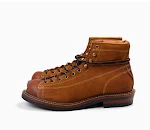 Botas de cano alto com bloco de cores retrô e bico redondo de couro bovino. Conforto e estilo em um só calçado, perfeitas para looks modernos e autênticos. — foto 7