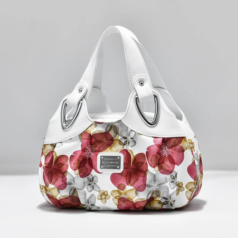 Bolsa feminina multicolorida e moderna. Acessório perfeito para adicionar estilo ao seu visual. Compre já! — foto 2
