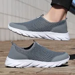 Tênis casual grande com cabedal em mesh, modelo de cano baixo. Conforto e estilo para uso diário. — foto 1