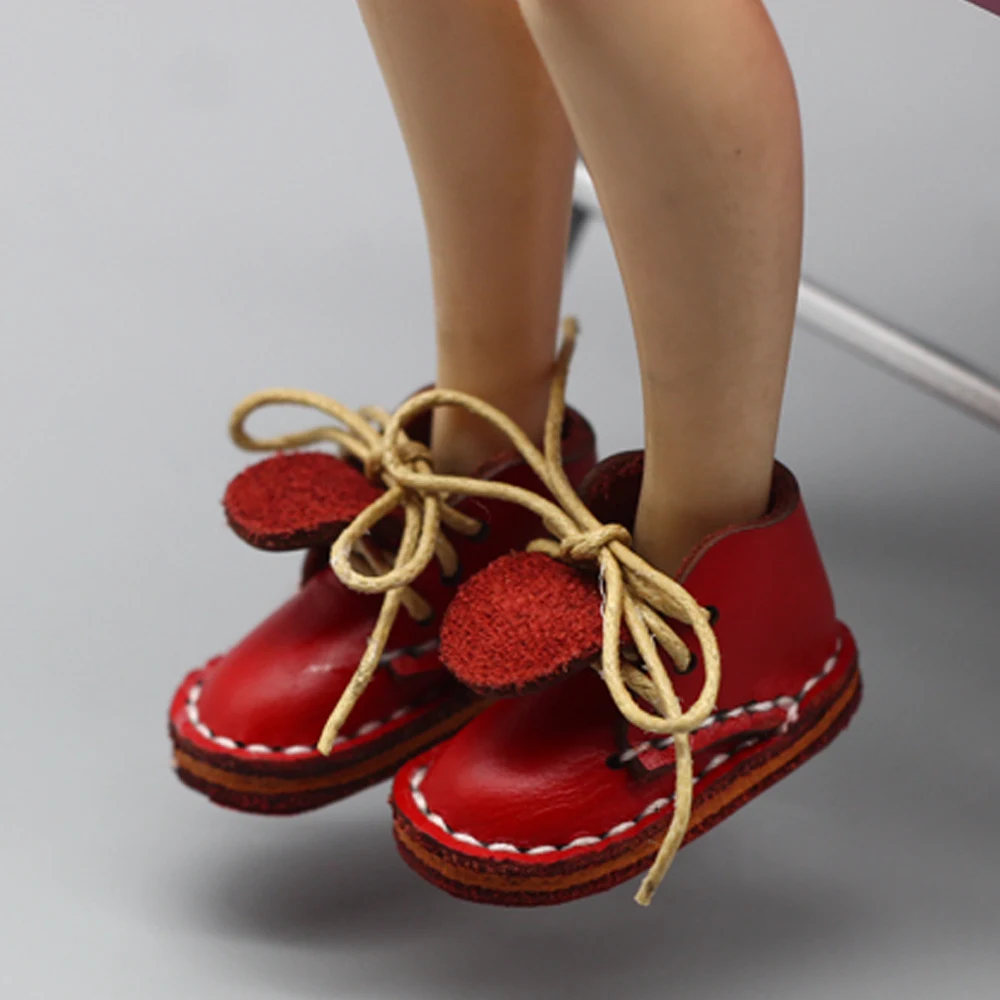 Sapatos de boneca e sapatos para bebês descalços Calçados macios e flexíveis para pés pequenos. Conforto e estilo para bonecas e recém-nascidos. — foto 9