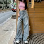 Jeans anchos retro lavados para mujer, corte holgado y pierna ancha. Comodidad y estilo vintage, perfectos para un look casual y moderno. — foto 8