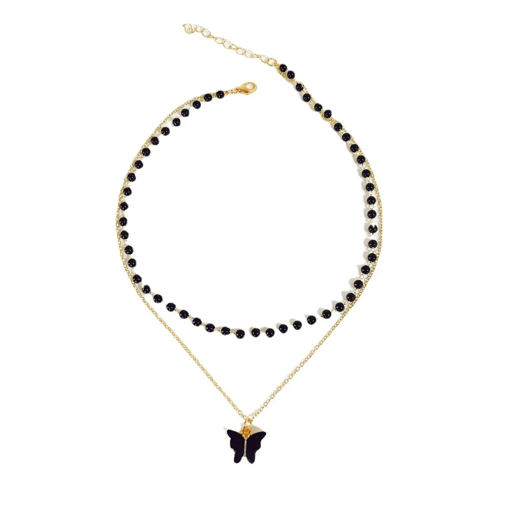 Colar com pingente de borboleta pérola preta, um acessório feminino elegante. Perfeito para realçar seu estilo e adicionar um toque sofisticado ao visual. — foto 6
