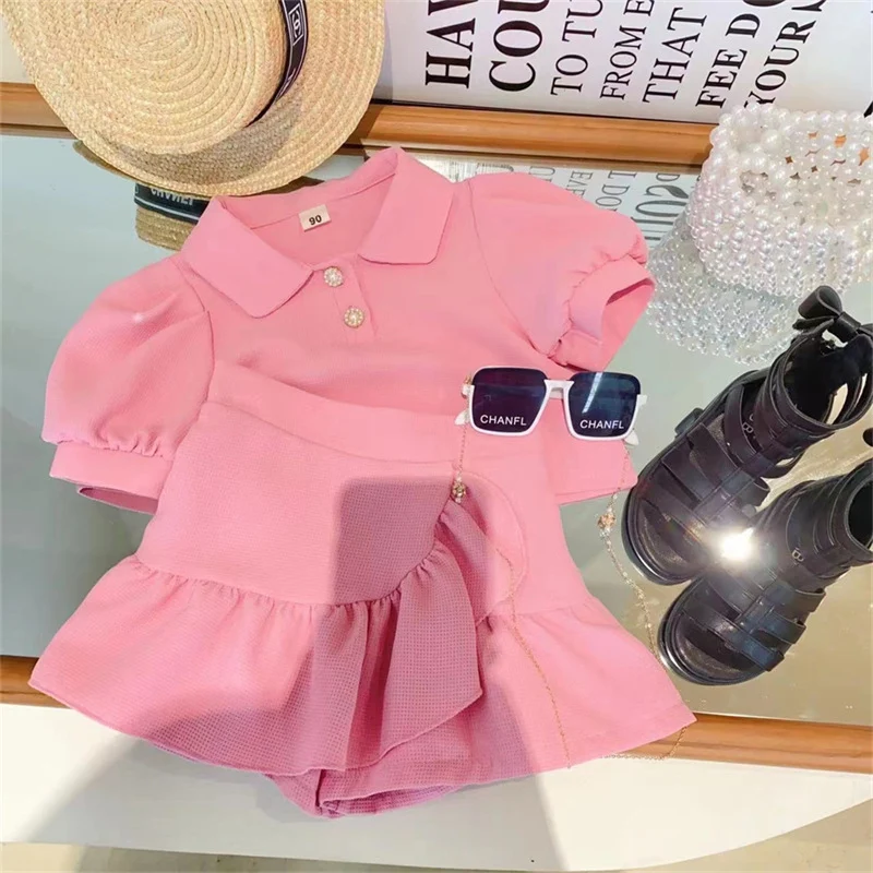 Conjunto de duas peças estilo ocidental com gola de bolhas waffle, manga curta, ideal para um visual moderno e confortável em diversas ocasiões. — foto 4