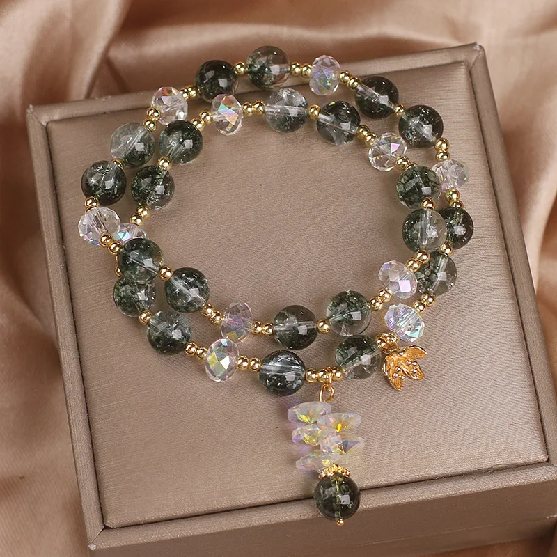 Pulseira de cristal feminina com pingente de flor, um acessório elegante para realçar seu visual e adicionar um toque de brilho. — foto 7