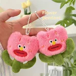 Creak Cute Plush Ugly Flower Doll Pendant Keychain, a charming and soft plush accessory to add a touch of fun and person — photo 3
