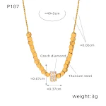 Colar de Aço Titânio Dourado com Pingente de Açúcar Cúbico, Design Geométrico Redondo e Zircônias para um Toque Sofisticado. — foto 2
