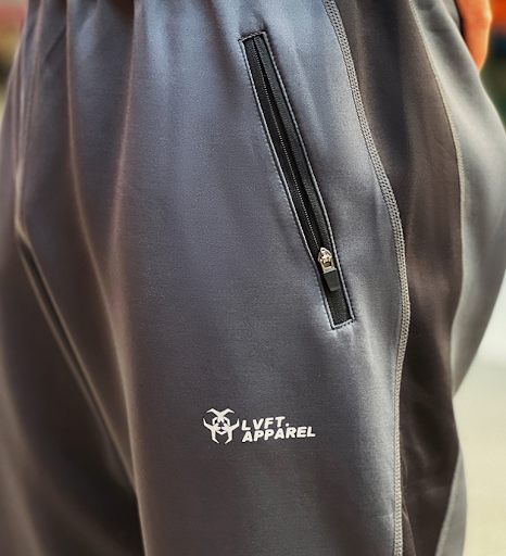 Title 2, Sweatpants with panel design, zip pocket, and s...