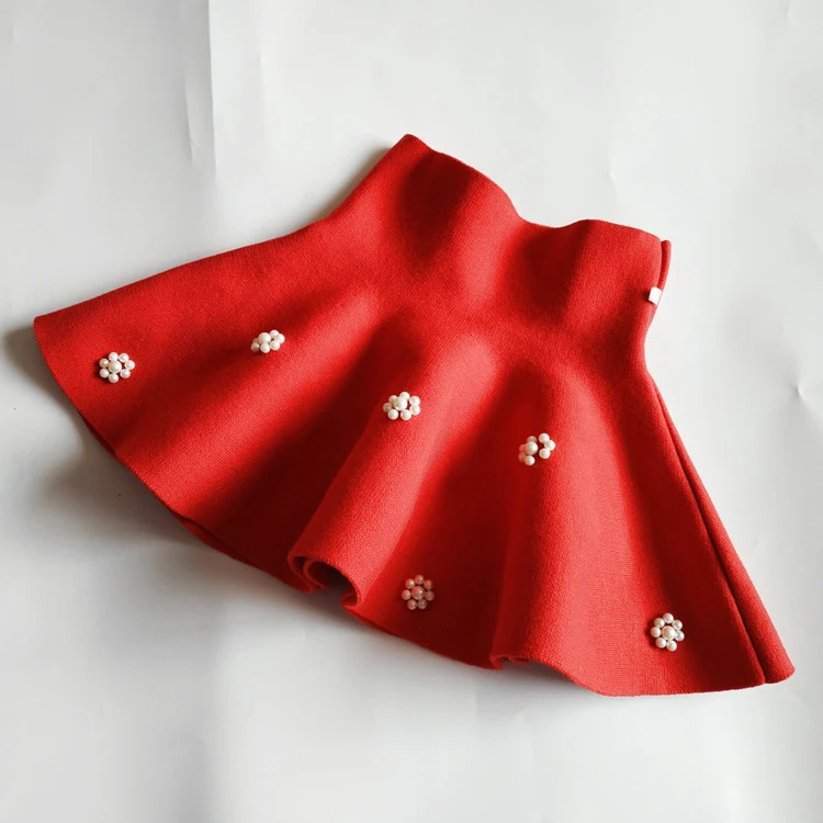 Mini falda de punto para niña, cintura alta, estilo paraguas, falda amplia con vuelo, ideal para jugar y bailar con comodidad. — foto 7