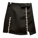 Saia com laço e fenda com grandes partículas de strass, design elegante e sofisticado, ideal para festas e eventos. — foto 4