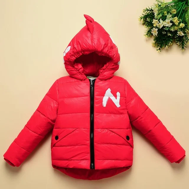 Casaco infantil de inverno com dinossauros para aquecer e proteger as crianças no frio. Design divertido e confortável para aventuras congelantes com estilo. — foto 1