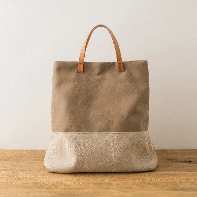 Bolsa mensageiro feminina de ombro único, portátil e grande de tecido. Conforto e praticidade para transportar seus pertences com elegância. — foto 2
