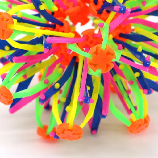 Title 7, Catch and Kick the Blossoming Ball Magic Toy. T...