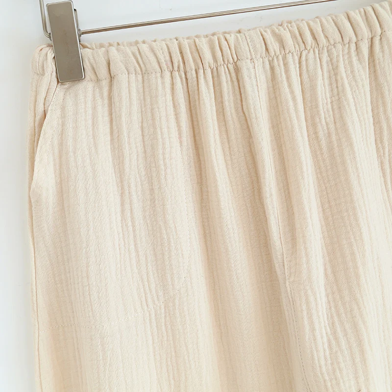 Dames katoenen pyjama met kwastjes Comfortabele pyjama set voor vrouwen. Zachte katoenen stof en stijlvolle kwastjes voor een goede nachtrust. — foto 19