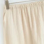 Dames katoenen pyjama met kwastjes Comfortabele pyjama set voor vrouwen. Zachte katoenen stof en stijlvolle kwastjes voor een goede nachtrust. — foto 19